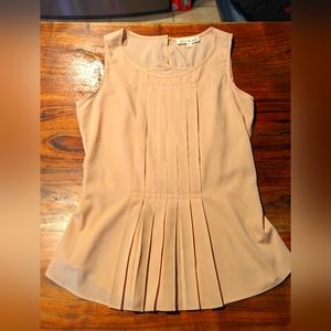 Peach colored shirt with center pleating